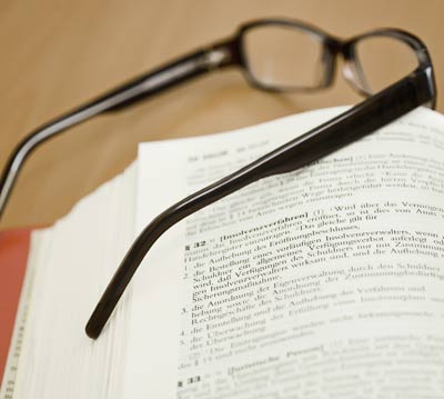 glasses on open book