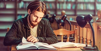 Male law student working on assignment